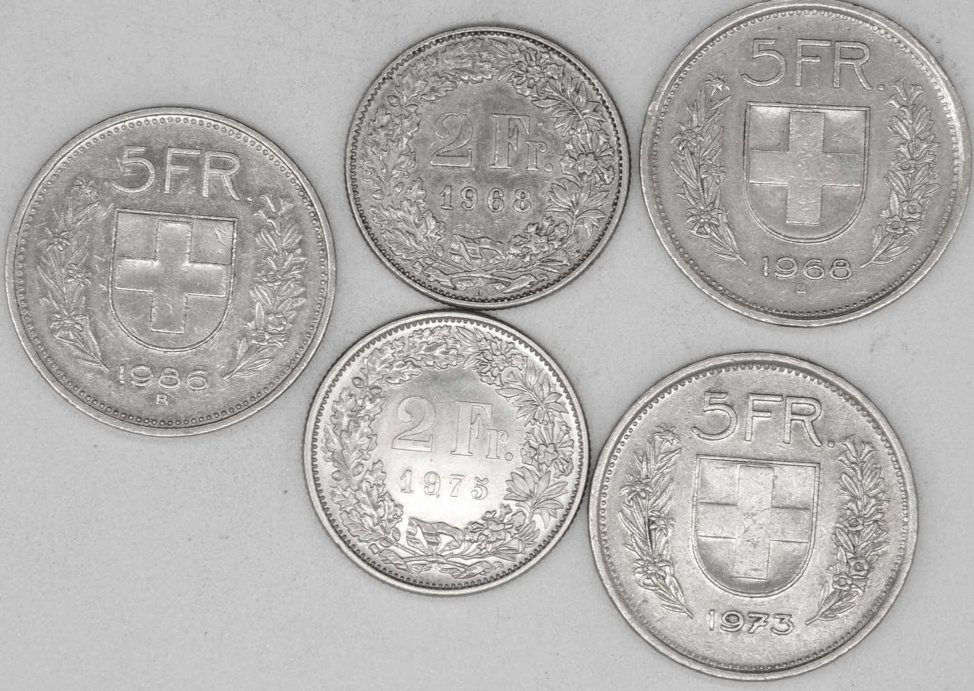 Schweiz 1966/86, Lot Umlaufmünzen, bestehend aus 3 x 5 Franken (1968, 1973, 1986) und 2 x 2