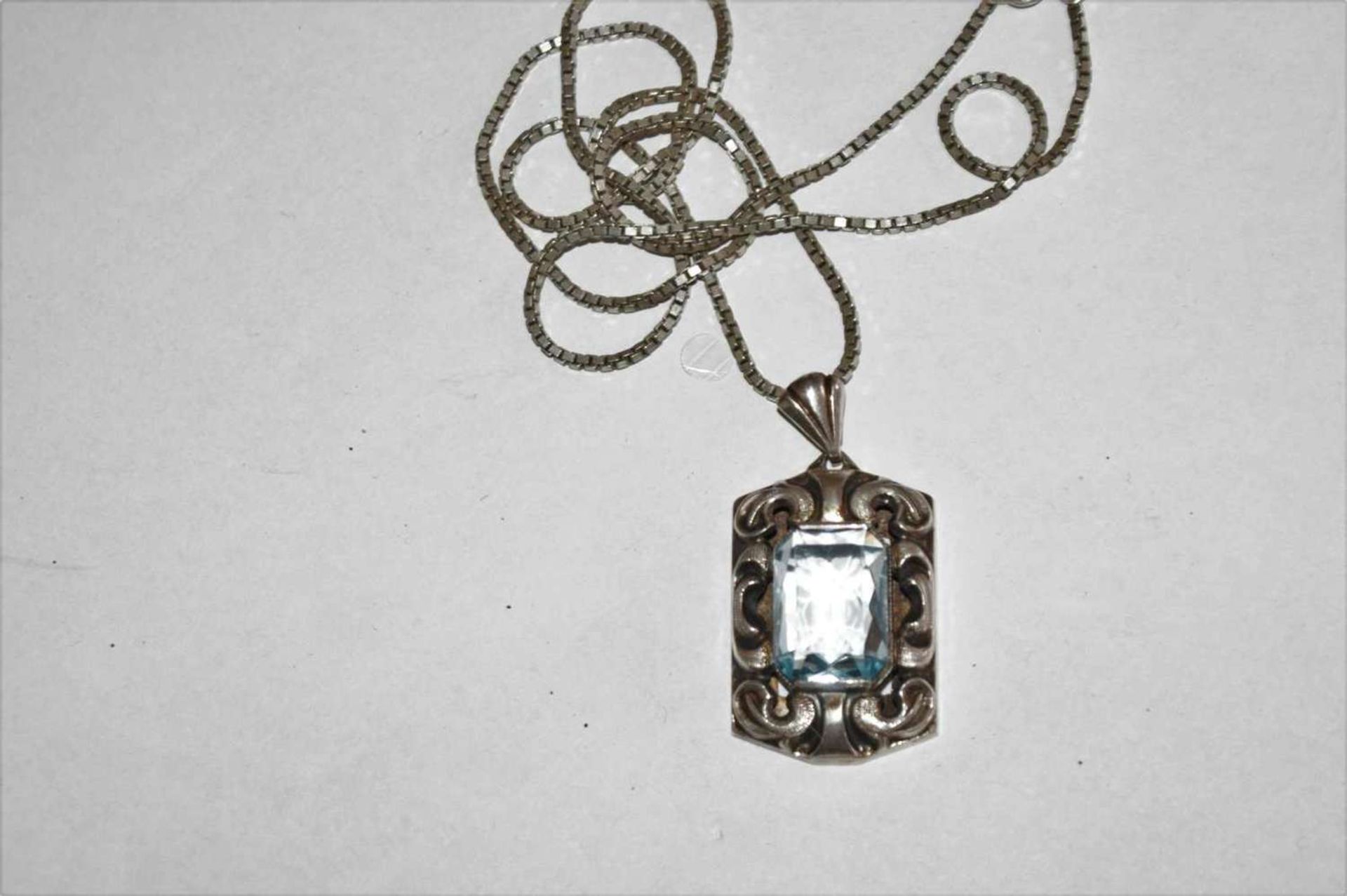 großer Anhänger besetzt mit Blautopas, 835er Silber Montur an 925er Silberkette.large pendant set