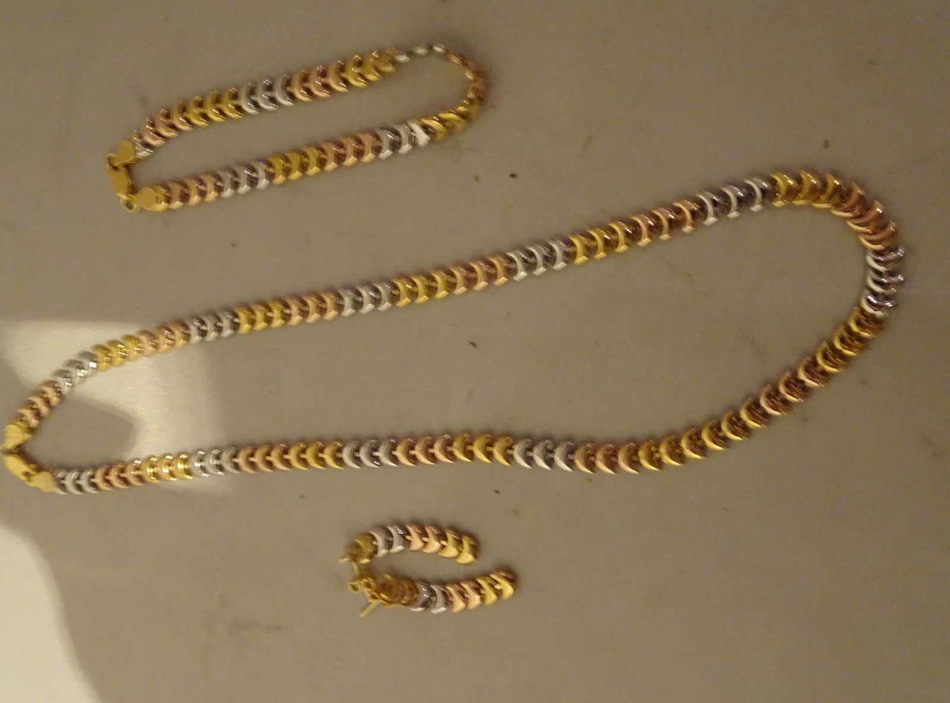 Schmuckset, 925er Silber vergoldet, bestehend aus 1 Kette, Länge ca. 42 cm, 1 Armband, Länge ca.