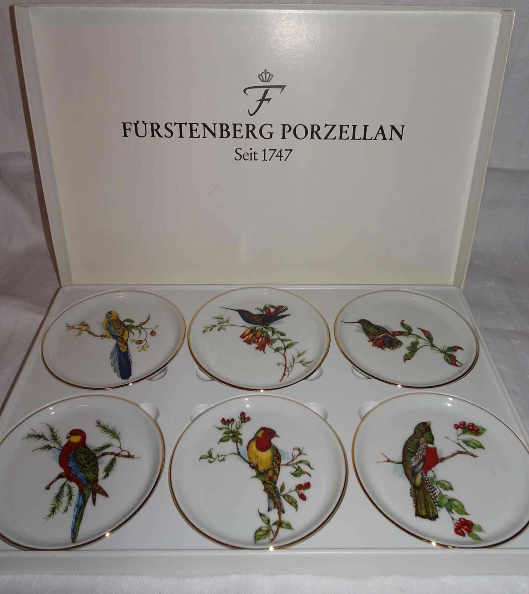 Fürstenberg Porzellan, 6 Zierteller Motiv Vogel. Teller mit Goldrand. Neu und Original verpackt.