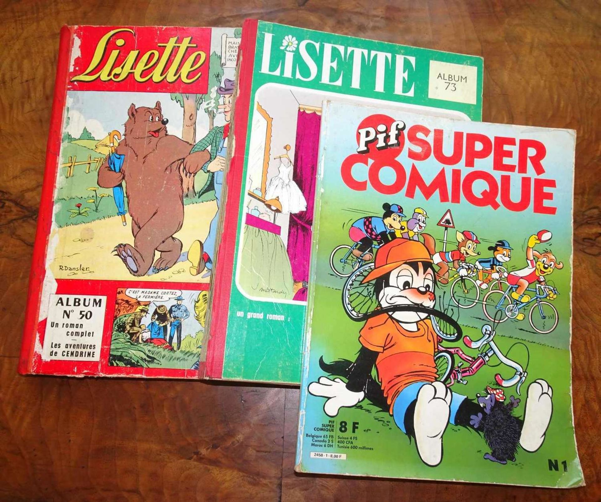 Lot französische Comics, dabei Pif Super Comique, Lisette Album 73 und Album 50. Stark gebrauchter