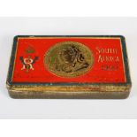 A rare surviving Boer War South Africa, 1900, chocolate tin with its original contents, 15.5cm