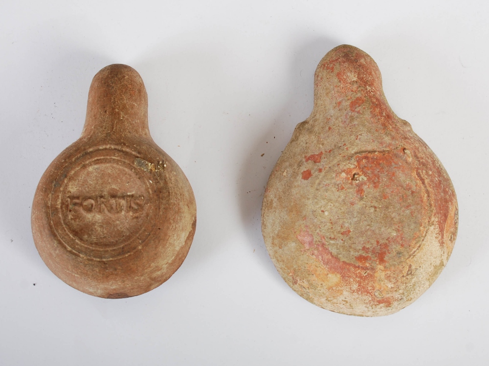 Antiquities- A collection of eight Ancient Roman terracotta oil lamps, comprising; one plain oil - Image 7 of 20