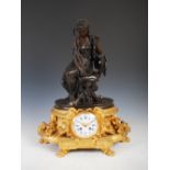 A late 19th century French bronze mantle clock, signed in the bronze D.MERCIER, the circular