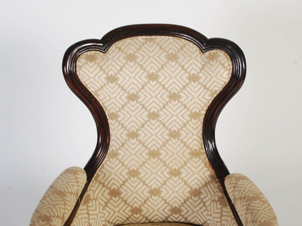 A pair of Chinese dark wood upholstered armchairs, Qing Dynasty, the shaped back, arms and stuffover - Image 6 of 8