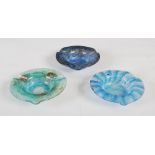 A group of three Monart ashtrays, shape ZH, comprising; blue and purple trailed line ashtray, 9.