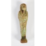 Antiquities- An Ancient Egyptian green glazed faience shabti, circa Late Period, with incised