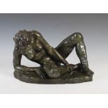 A 20th century bronze figure of a recumbent nude female, indistinctly signed Chardo in the bronze,