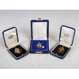 A collection of three 9ct gold and enamel Scottish Football League medals, comprising; League Cup