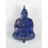 A Chinese lapis lazuli pendant carved as a scholar, Qing Dynasty, with later white metal mount, 6.