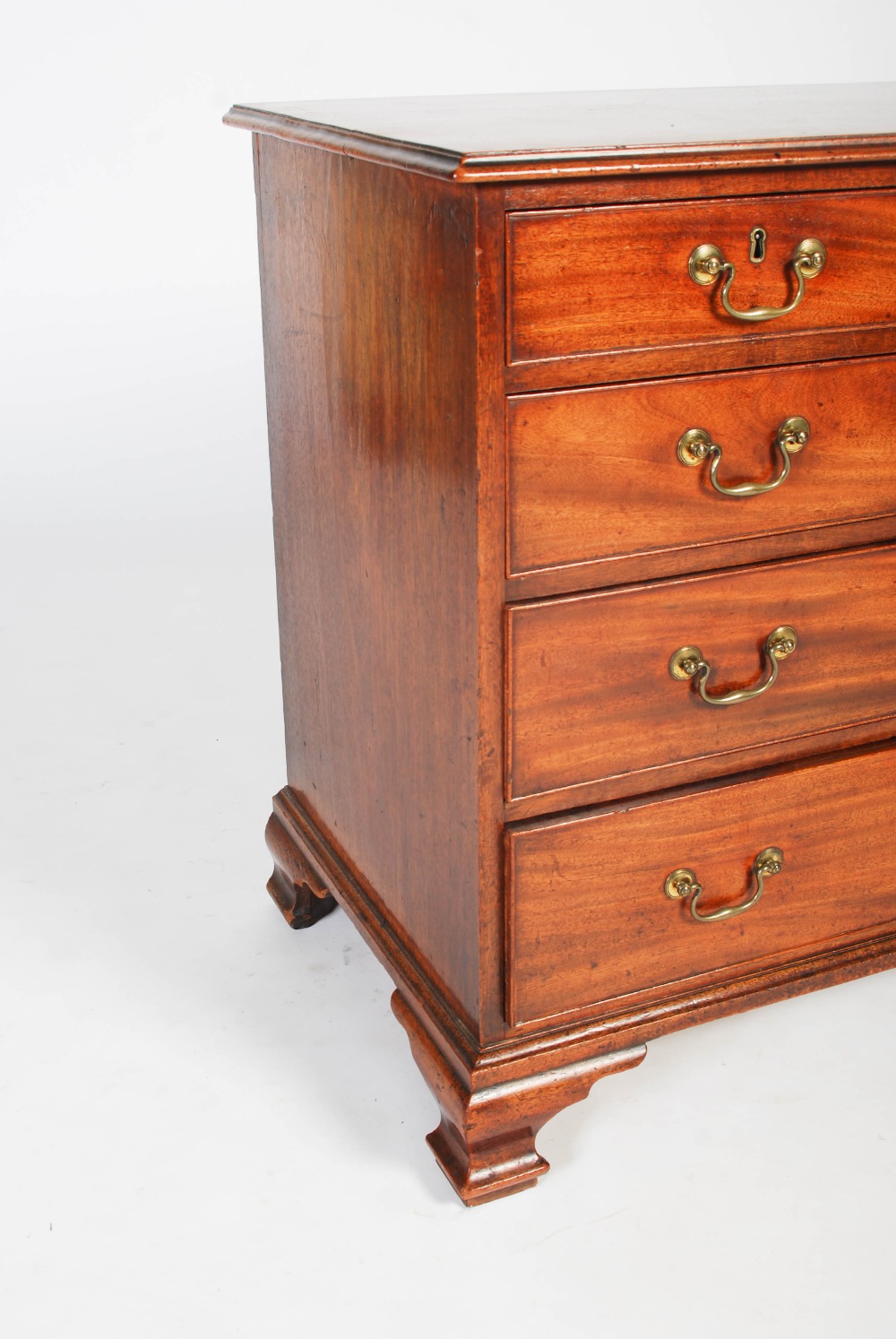 A George III mahogany chest of drawers of neat proportions, the rectangular top with moulded edge - Image 3 of 7