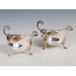 A pair of George III silver sauce boats, London, 1812, makers mark rubbed, with scroll and foliate