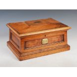 A 19th century walnut sarcophagus shaped casket, inscribed on brass plaque 'Argyle Square Church