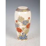 A Japanese Satsuma pottery vase, Meiji Period, with red, blue and green enamelled decoration of