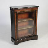 A Victorian ebonised and burr walnut pier cabinet, the rectangular top and plain frieze above a