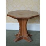 Robert "Mouseman" Thomson, An oak octagonal shaped occasional table, the octagonal shaped top on
