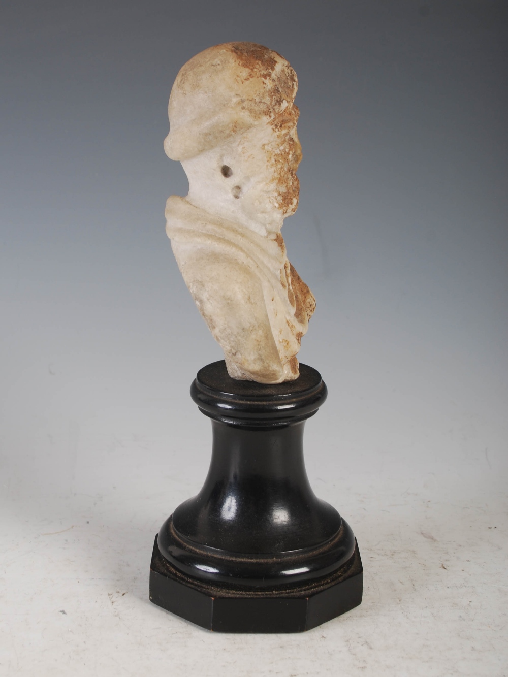 Antiquities- An antique Roman marble bust of a bearded male, mounted on weighted ebonised socle - Image 4 of 11