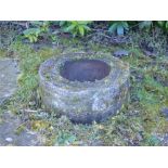 An early 20th century circular stone garden planter, 41.5cm diameter x 25.5cm high.