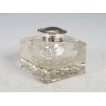 An Edwardian silver mounted cut glass inkwell, Chester, 1900, makers mark rubbed, 7.5cm square x 7cm