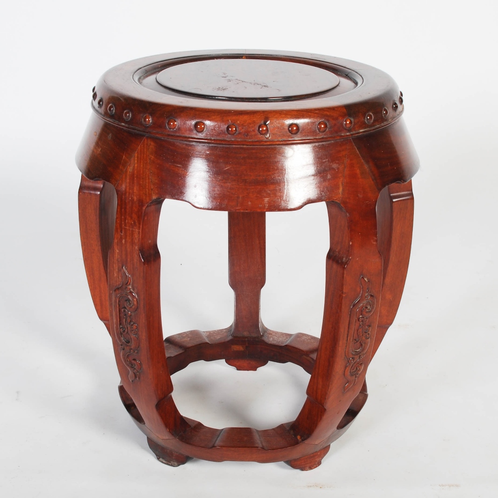 A Chinese dark wood barrel shaped stool, 20th century, the circular panelled top within a studded - Image 6 of 6