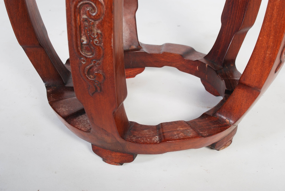 A Chinese dark wood barrel shaped stool, 20th century, the circular panelled top within a studded - Image 4 of 6