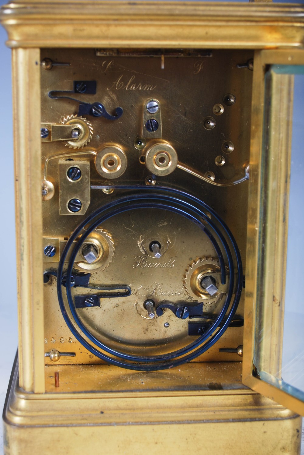 A 19th century brass cased repeater carriage clock with alarm, the white enamel dial with Arabic and - Image 8 of 12