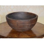A 20th century turned fruit wood bowl, with horizontal incised detail, 42cm diameter x 19.5cm high.