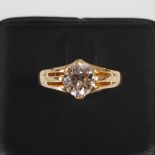 A yellow metal solitaire diamond ring, centred with an old cut diamond calculated to weight 2.