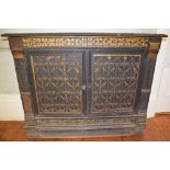 A 19th century pine, ebonised and gilt decorated Country House pier cabinet of neat proportions, the