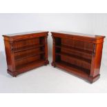 A near pair of 19th century mahogany open bookcases, the rectangular tops and convex friezes above