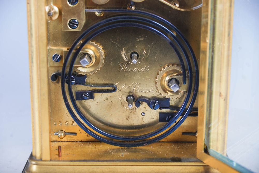 A 19th century brass cased repeater carriage clock with alarm, the white enamel dial with Arabic and - Image 10 of 12