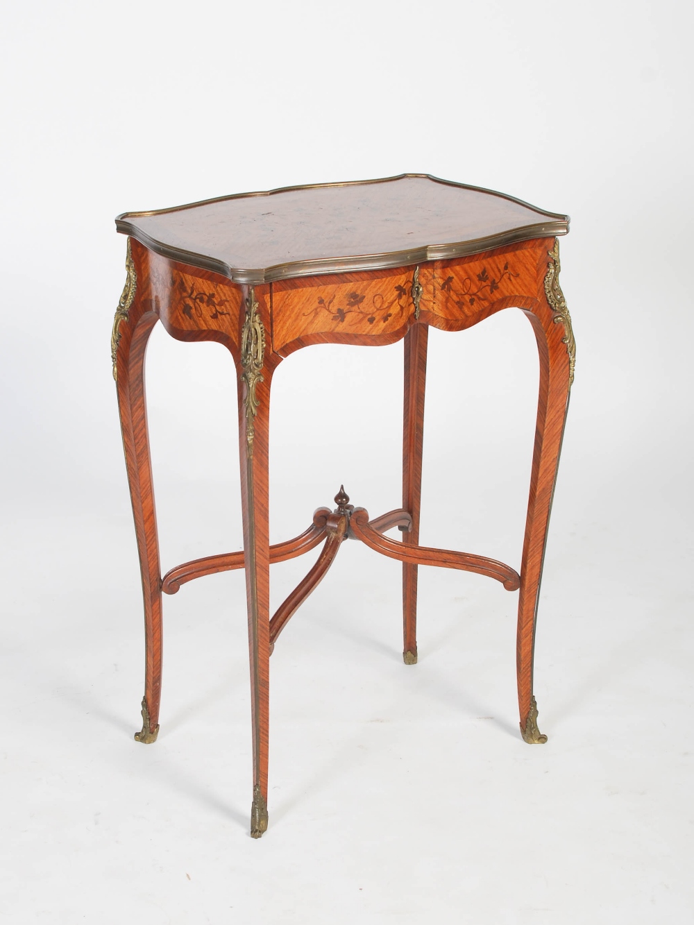 A late 19th century French kingwood, marquetry and gilt metal mounted occasional table, the shaped