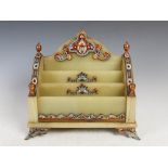 A late 19th century onyx and champleve enamel letter rack, with three open graduated divisions,