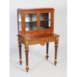 A late 19th century kingwood, boxwood lined and gilt metal mounted bonheur de jour, the upper