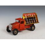 An early 20th century American Metalcraft 'Coca-Cola' toy advertising truck, loaded with eight