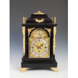 A late 19th century ebonised and gilt metal mounted Westminster chime bracket clock by