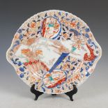 A late 19th/early 20th century Japanese porcelain Imari twin handled dish, decorated with fan shaped