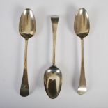 A set of three George III silver table spoons, London, makers mark of IM, dated letters obscured,