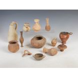 Antiquities- A collection of Ancient Roman pottery, comprising; small aryballos with oviform body