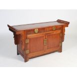 A Chinese dark wood side cabinet, Qing Dynasty, the rectangular panelled top with slightly raised