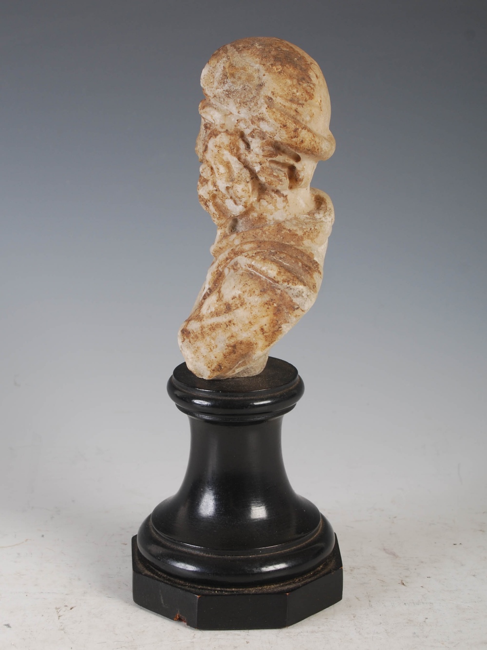 Antiquities- An antique Roman marble bust of a bearded male, mounted on weighted ebonised socle - Image 2 of 11