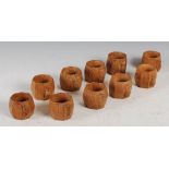 Mouseman- a set of ten oak octagonal shaped napkin rings, each carved with signature mouse, 4.5cm