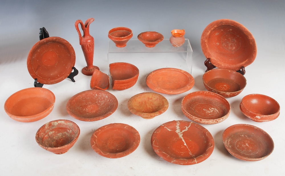 Antiquities- A collection of Ancient Roman terracotta pottery, comprising ; a shallow footed bowl