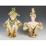 A pair of Austrian porcelain Belle Epoque busts, moulded as a female with ribbon tied feather hair