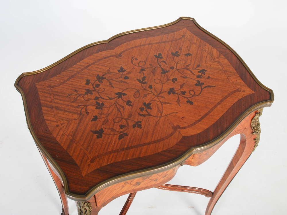 A late 19th century French kingwood, marquetry and gilt metal mounted occasional table, the shaped - Image 2 of 8