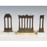 A group of three Grand Tour bronze models of Roman ruins, late 19th/ early 20th century, comprising;