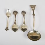 A pair of mid 20th century Arts & Crafts style silver spoons, Birmingham, 1947, makers mark of D&