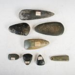 Antiquities- A collection of eight Southern French green stone hand tools/ adzes, 19th century and