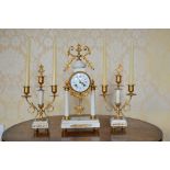 A late 19th century French white marble and gilt metal mounted clock garniture, comprising: mantel