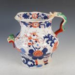 A large 19th century English Ironstone octagonal shaped serpent handled jug, probably Masons,